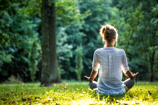 Woman meditating in Bourgogne France